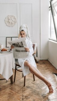 Woman eating a croissant