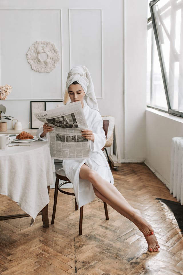 Woman eating a croissant
