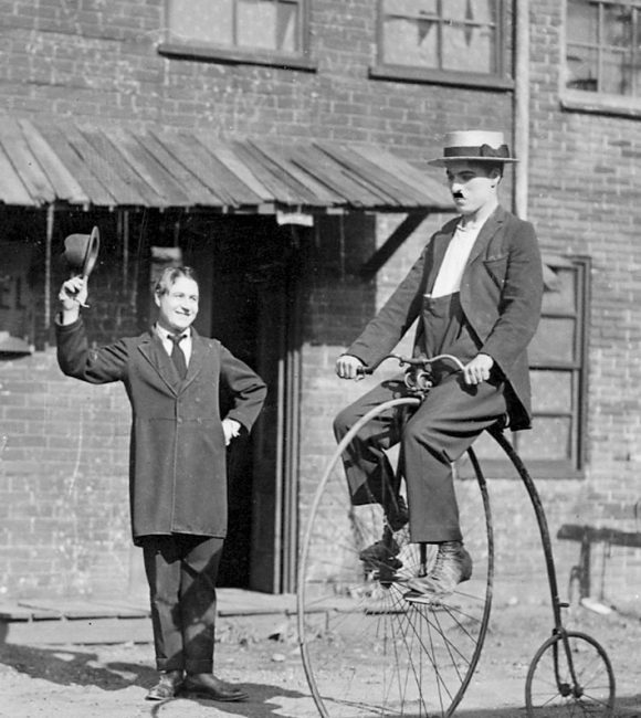 Charlie Chaplin on a bike